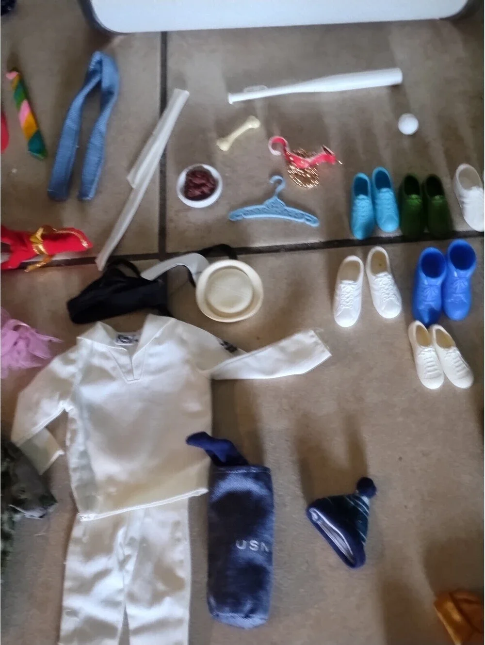 1960s Ken doll clothing and shoe lot and case